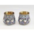 Pair of Imperial Russian Silver-Gilt Cloisonné Enamel Nevalyashka (Rocking Shot Cups) with Swans, Moscow, 1883